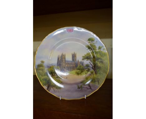 A Royal Worcester cabinet plate, painted with Canterbury Cathedral, by Nicholls, 27.5cm diameter. 