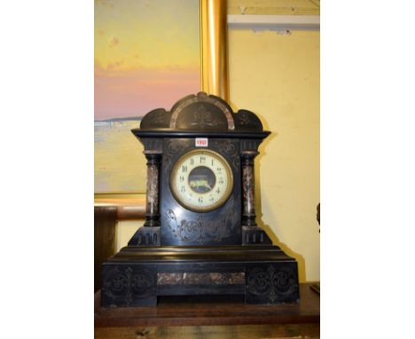 A slate and marble mantel clock, 52cm high. 