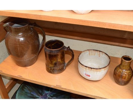 Studio Pottery: four Wenford pottery items, to include a Seth Cardew jug, 20.5cm high; a similar mug; and a Michael Cardew va