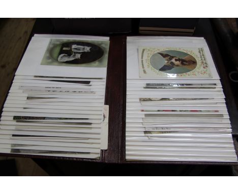 An album of postcards, to include examples of Louis Wain.   Condition Report:  All cards are vintage.  1 x 'The long and shor