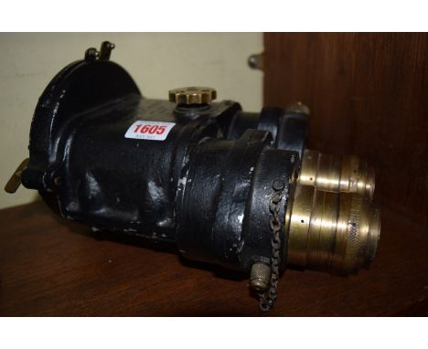 A World War II period binocular gun sight, by Ross, dated 1941 and with broad arrow, No.121082. 