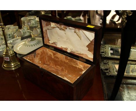 A George III mahogany and crossbanded tea caddy, 30.5cm wide. 