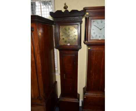 An 18th century oak 8 day longcase clock, the 11½ inch square brass dial inscribed 'Phillips, Bromyard', with arched date ape