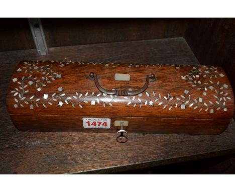 A Victorian rosewood and mother of pearl inlaid glove type box, 25cm wide. 
