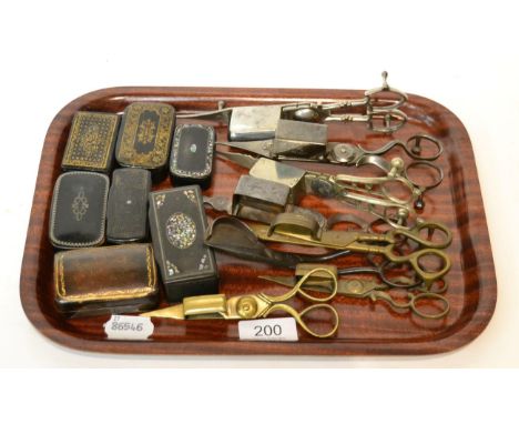 A group of early 19th century and later brass and silver plate candle snuffers, together with a group of 19th century mother 