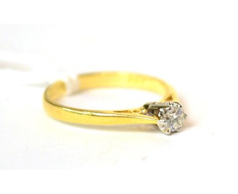 An 18ct gold diamond solitaire ring, 0.15 carat approximately, finger size K 2g