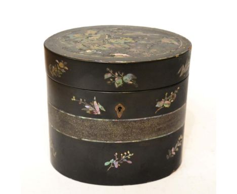 A Japanese lacquer and mother of pearl inlaid oval tea caddy 