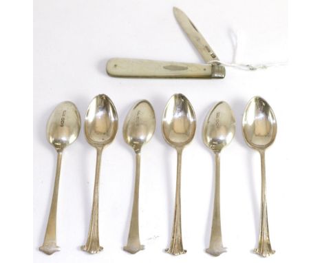 A mother of pearl pen knife with a silver blade, by James Fenton, Sheffield, 1901 and a set of six silver coffee spoons by He