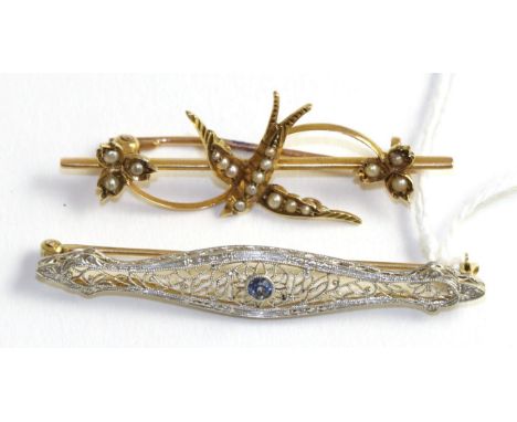 A sapphire bar brooch, stamped '14K', and a seed pearl swallow brooch, stamped '15CT' (2)6g