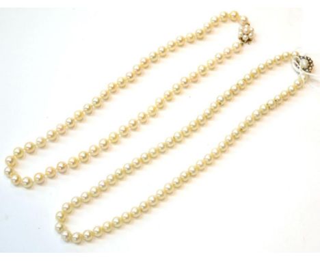 Two cultured pearl necklaces with pearl set clasps  
