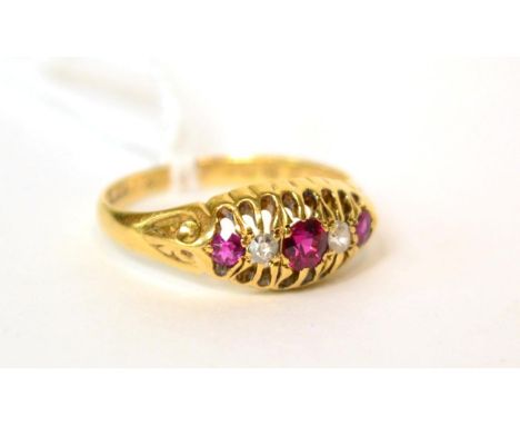 An 18ct gold ruby and diamond ring, finger size N 2.4g