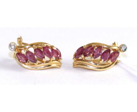 A pair of 14ct gold ruby and diamond earrings, with French clip fittings 4.18g