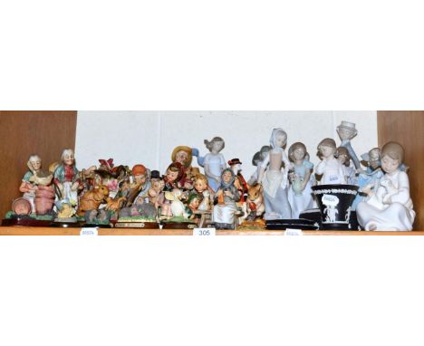 A collection of Nao figure groups, two Lladro examples, Goebel figures, other German and foreign figure groups and Wedgwood J