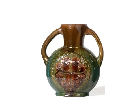 Christopher Dresser for Linthorpe Pottery: A Twin-Handled Vase, shape No.337, moulded with a repeating Aztec designs to each 