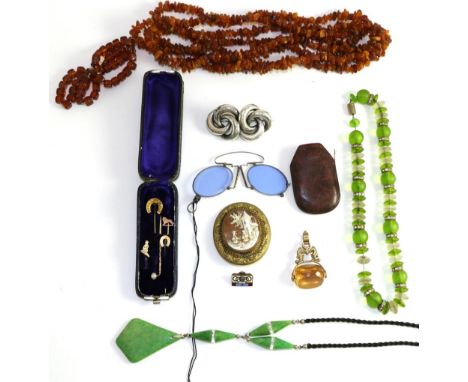 A collection of jewellery comprising 1932 Olympic badge; a cameo brooch; a swivel fob; amber necklace; Art Deco necklace; sti