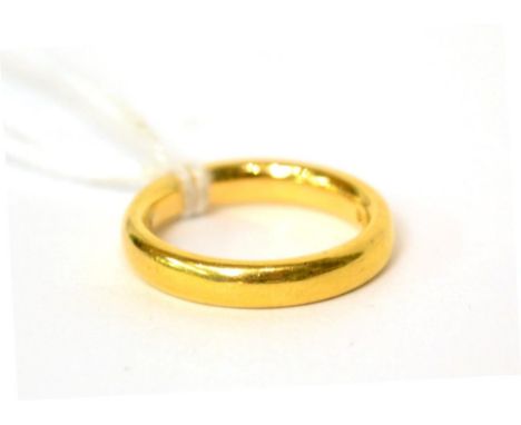 A 22ct gold band ring 6.77g, size K