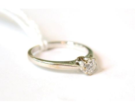 An 18ct white gold diamond solitaire ring, 0.25 carat approximately, finger size K 2.6g