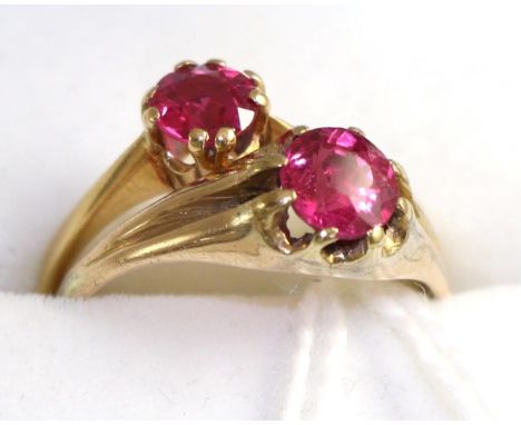 Two synthetic ruby rings, both finger size N 4.8g gross