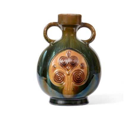 Christopher Dresser for Linthorpe Pottery: A Twin-Handled Vase, shape No.336, moulded with an abstract leaf design to each si