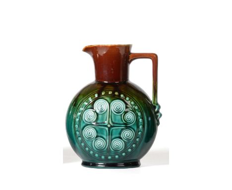 Christopher Dresser for Linthorpe Pottery: A Jug, shape No.805, moulded with a repeating designs to each side, impressed LINT