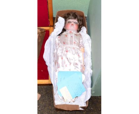 K & R Simon and Halbig 403 bisque socket head walking doll, with brown wig, sleeping blue eyes, open mouth, on a composition 