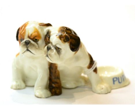 A Royal Worcester model of two dogs together, no. 3133Lightly crazed otherwise good condition