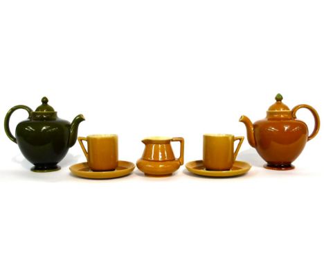 Christopher Dresser for Linthorpe Pottery: A Teapot, shape No.662, mustard glaze, impressed LINTHORPE Chr Dresser 662 HT, 15c