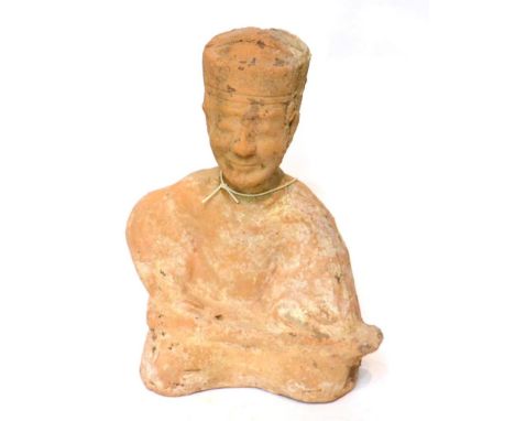 A Chinese pottery seated musician, possibly Han Dynasty, circa 200BCE-200AD, modelled in the round playing a guqin on his lap