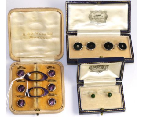 A pair of nephrite dress studs, stamped '15ct' in a fitted case, a cased set of six purple guilloche enamel dress studs with 