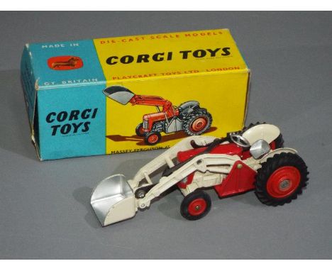 Corgi Toys - A boxed Corgi #53 Massey Ferguson 65 Tractor with Shovel. The model with red bonnet, black and white decals, sil