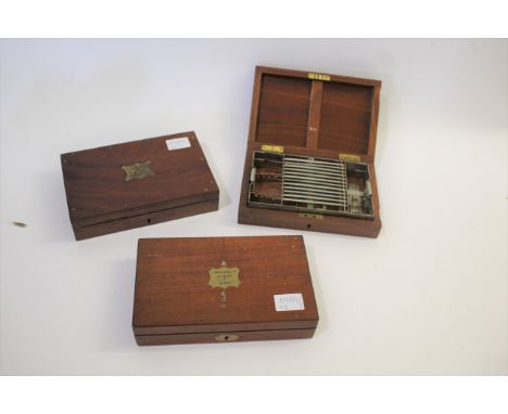 CASED MILITARY MEDICAL INSTRUMENTS 3 mahogany cases containing various medical instruments, one case marked with a brass plaq