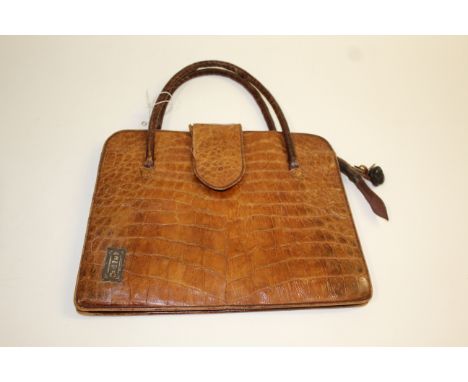CROCODILE SKIN HANDBAG a vintage bag with compartments inside and loop handles, with a small plaque on the front with initial