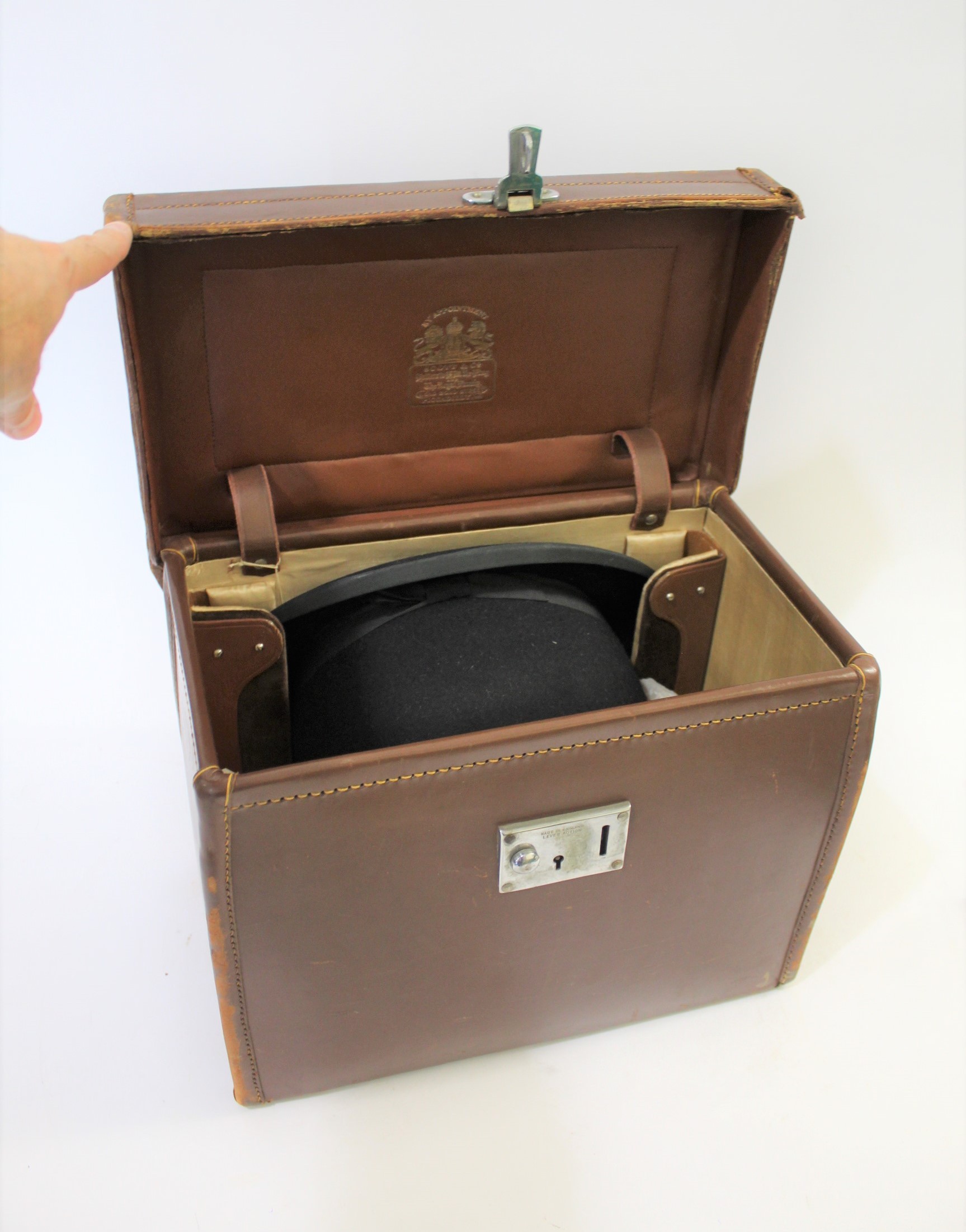 LEATHER CASED HAT BOX & BOWLER HAT a fitted leather hat box by Scott
