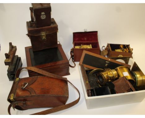 TABLE TOP ENLARGER, MAGIC LANTERN LENSES &amp; OTHER ITEMS a mahogany table top enlarger and some enlarger parts, also with s