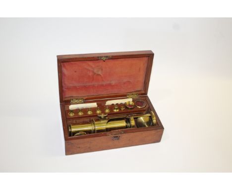CASED MICROSCOPE &amp; SLIDES a brass compound monocular microscope, the fitted case with a variety of lenses and accessories