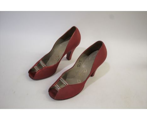PAIR OF VINTAGE RAYNE SHOES - MARGARET LOCKWOOD a pair of pink satin peep toe shoes with diamonte strap detail, marked Rayne 