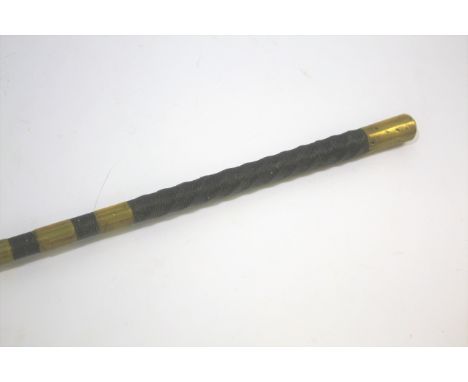 DRIVING/CARRIAGE WHIP the driving whip with a brass top and brass collars down the length of the shaft. 148cms long