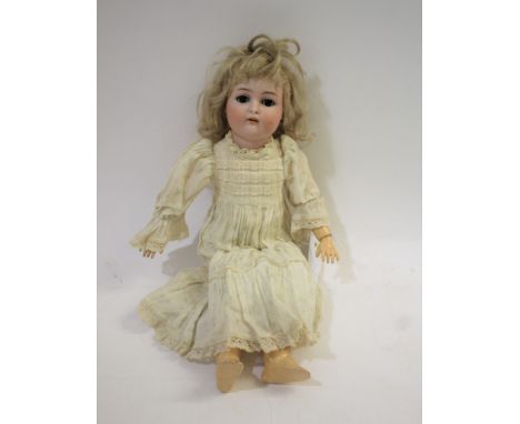 BISQUE HEAD DOLL - SIMON &amp; HALBIG FOR KAMMER &amp; REINHARDT the doll with weighted brown eyes, open mouth and pierced ea