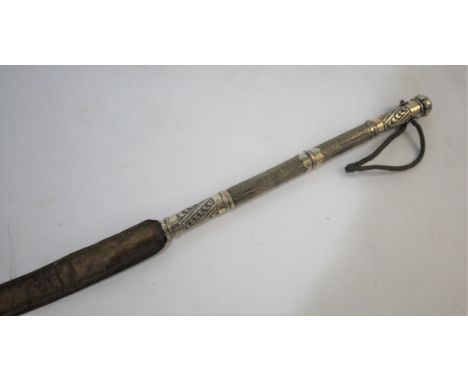 RIDING WHIP an interesting whip with a white metal top section, and with a leather bottom section. 73cms long