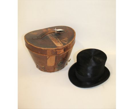VINTAGE LEATHER HAT BOX &amp; TOP HAT a vintage leather case with a lined interior and brass lock, also with a Austin Reed bl