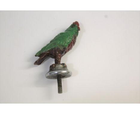 CAR MASCOT - PARROT a car mascot in the form of a metal parrot, mounted on a metal fixing. Marked, CB Ltd. 12cms high overall