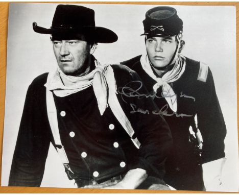 The Searchers John Wayne movie 8x10 photo signed by Patrick Wayne. He adopted his father's stage surname, Wayne. He made elev