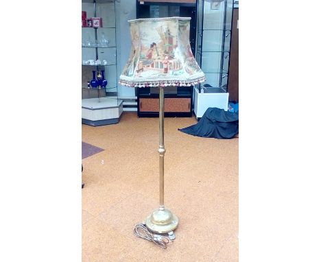 Early 20th century bras standard lamp on paw feet