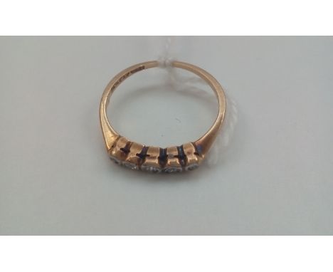18 carat gold ring set with seven diamonds, size M