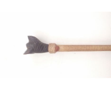 Riding crop with hounds head finial 