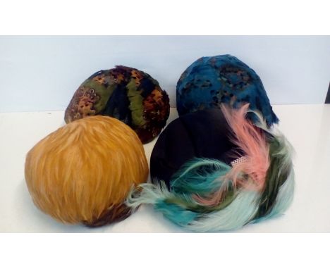 Group of four vintage feather cloches 