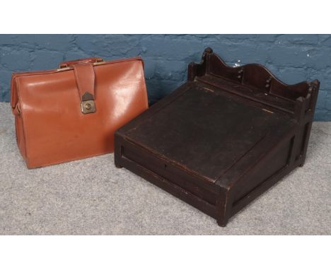 A vintage tabletop stationary slope &amp; vintage leather briefcase/doctors bag.  