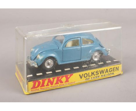 A boxed Meccano Dinky diecast model car. Volkswagen De Luxe Saloon, 129.  
