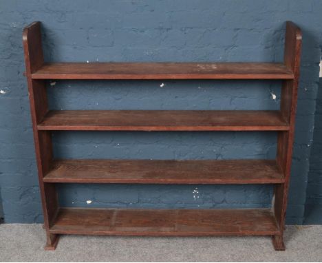 An oak four shelf open bookcase. (115cm x 130cm x 23cm).  