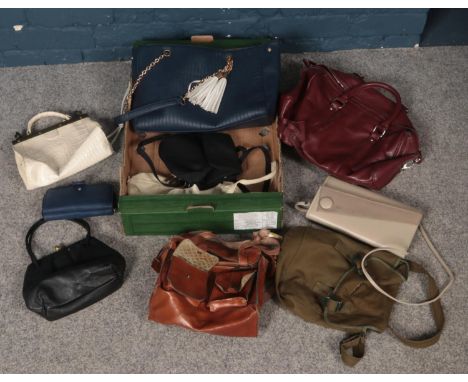 A box of vintage handbags and purses.  